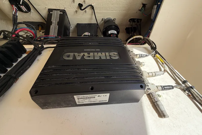 Slide: The Image of Simrad marine processor in 2015 Cobia 344 Center Console boat. - 123