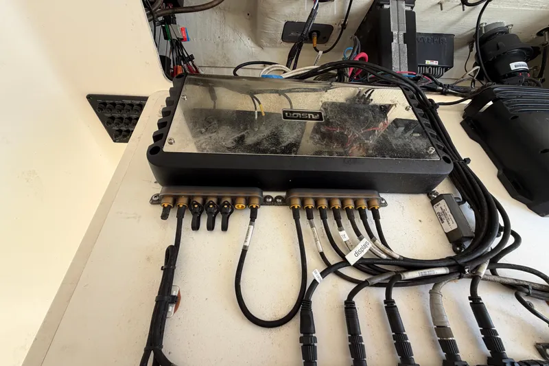 Slide: The Image of Electrical wiring and components inside a 2015 Cobia 344 Center Console boat. - 124