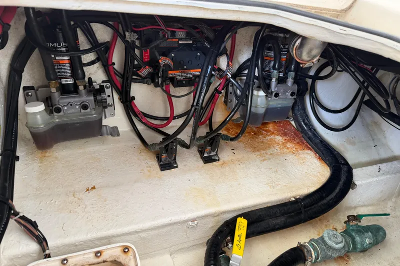Slide: The Image of 2015 Cobia 344 Center Console boat wiring and hydraulic system components. - 29
