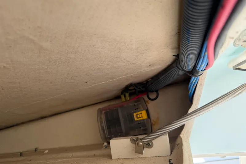 Slide: The Image of 2015 Cobia 344 Center Console wiring and fuse box detail. - 54