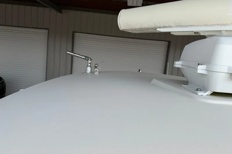 Slide: The Image of 2015 Cobia 344 Center Console boat radar and equipment close-up. - 69