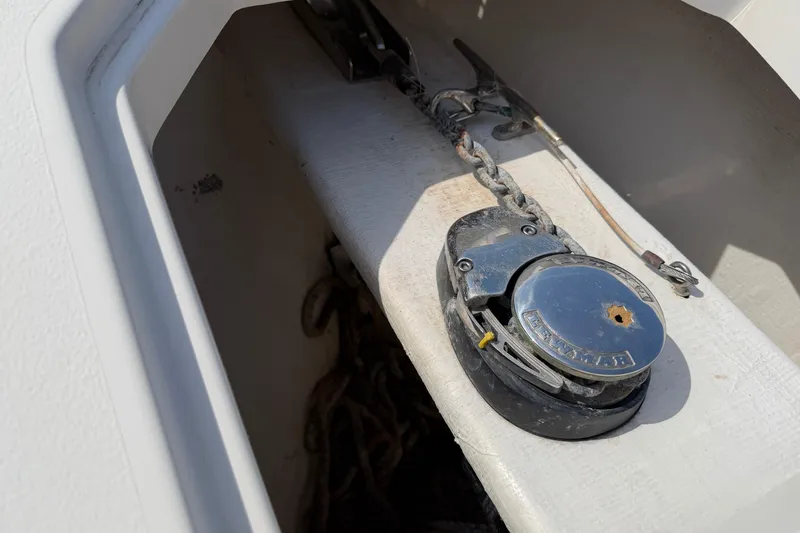 Slide: The Image of 2015 Cobia 344 Center Console anchor chain and winch detail. - 75