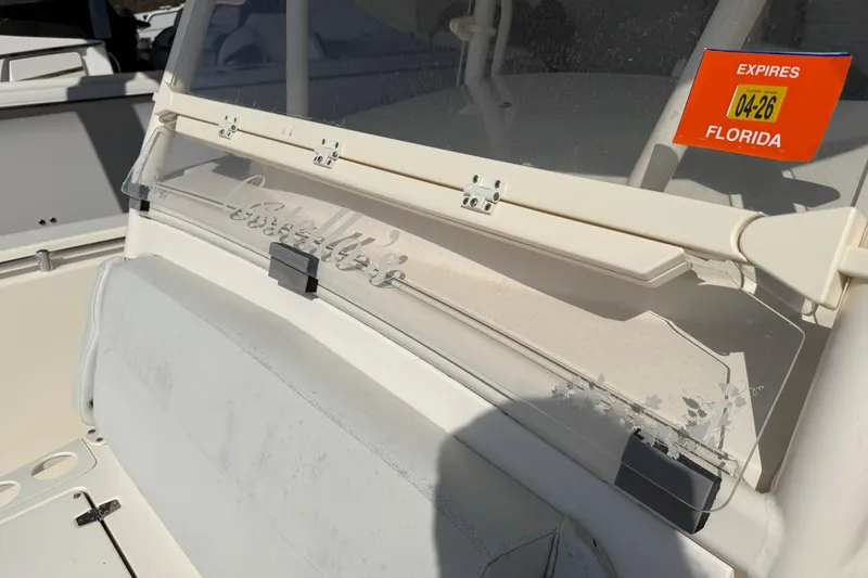 Slide: The Image of 2015 Cobia 344 Center Console boat with Florida registration sticker. - 97