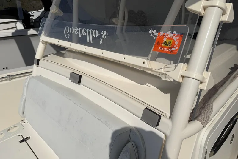Slide: The Image of 2015 Cobia 344 Center Console boat with Florida registration sticker. - 98