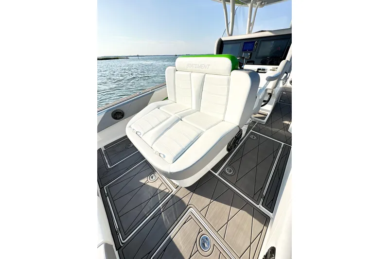 Slide: The Image of 2023 Statement 350 Open boat interior with luxurious seating and modern dashboard. - 16