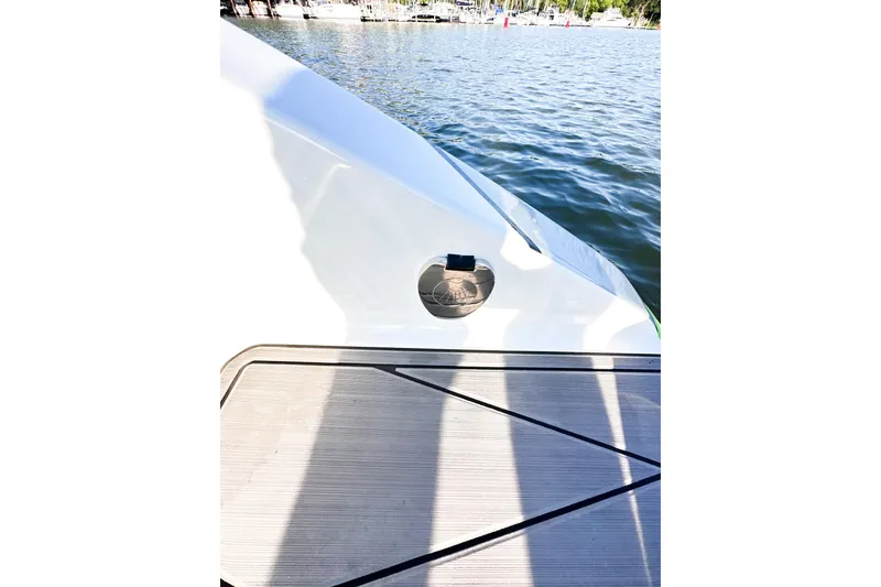 Slide: The Image of 2023 Statement 350 Open boat deck with water view. - 27