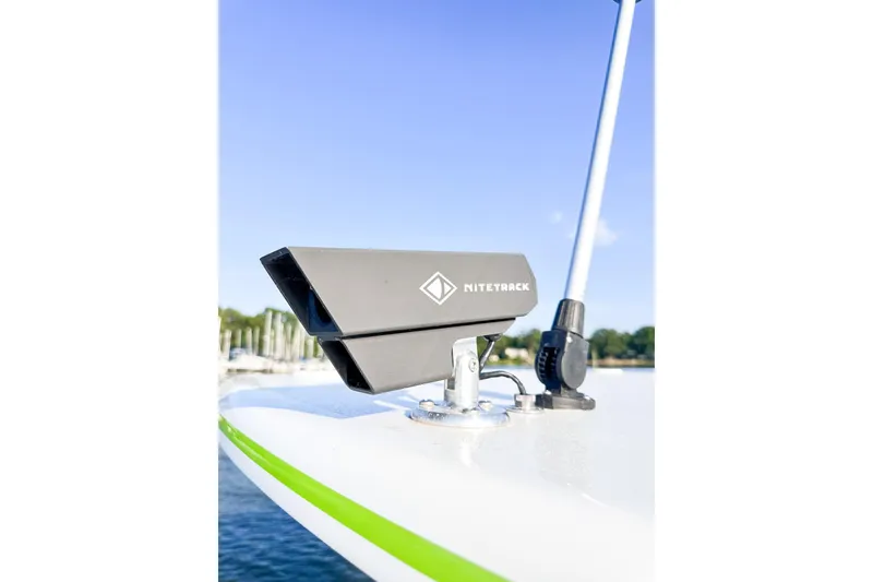 Slide: The Image of NITETRACK device on 2023 Statement 350 Open boat, docked with clear sky background. - 29