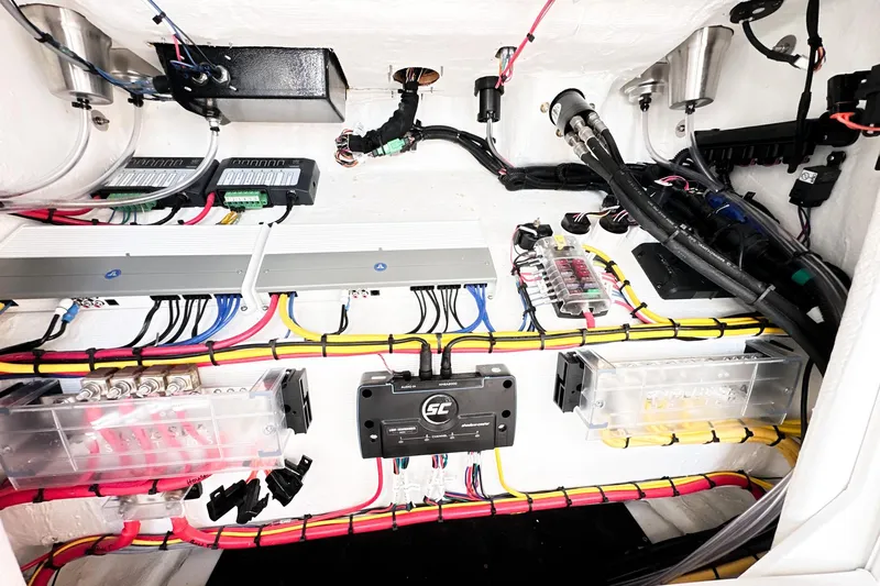 Slide: The Image of Electrical system of 2023 Statement 350 Open boat with organized wiring and components. - 32