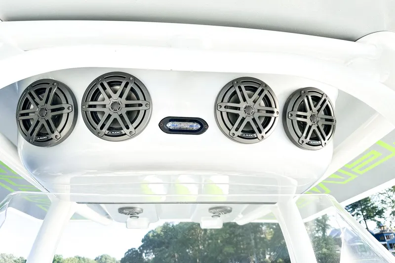 Slide: The Image of 2023 Statement 350 Open boat speakers and light on white panel. - 9