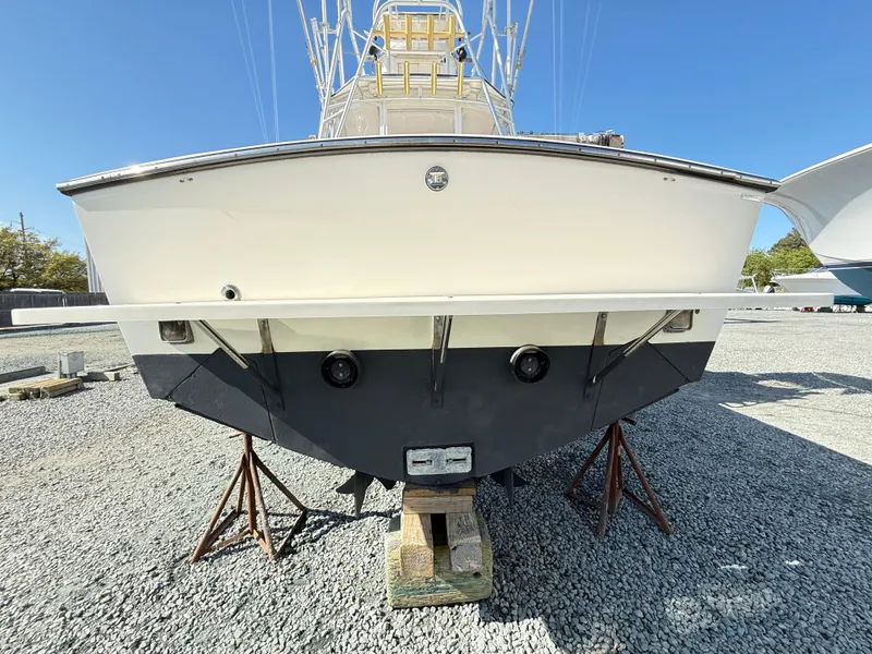 Slide: The Image of 2001 Albemarle 280 Express Sport Fisherman boat on stands, rear view, clear sky. - 3