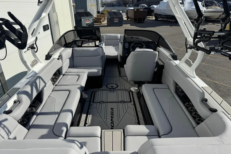 Slide: The Image of 2026 Moomba Mojo boat interior with spacious seating and modern design. - 5