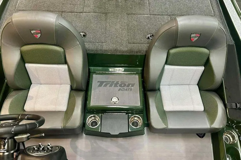 Slide: The Image of Interior of 2026 Triton 19 TrX boat with dual seats and steering wheel. - 14
