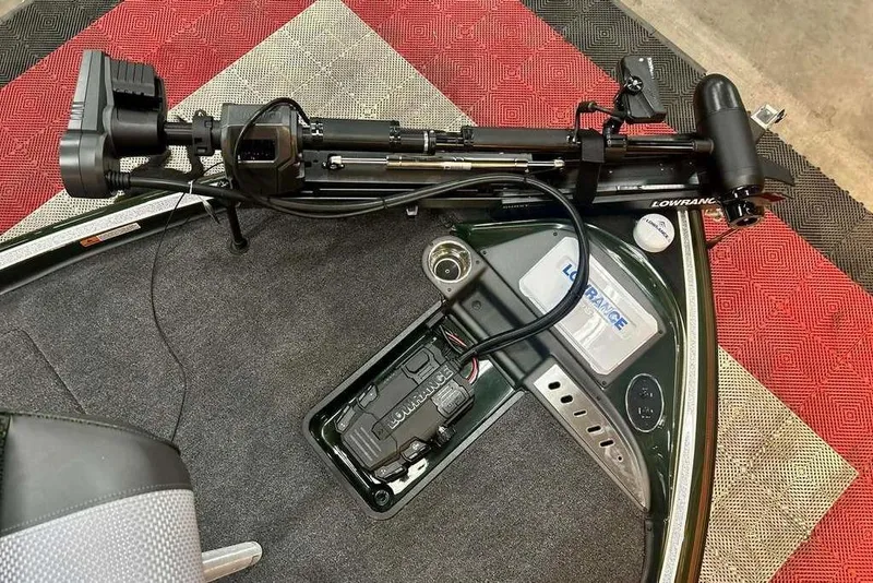 Slide: The Image of Triton 19 TrX 2026 boat deck with Lowrance trolling motor and electronics. - 7