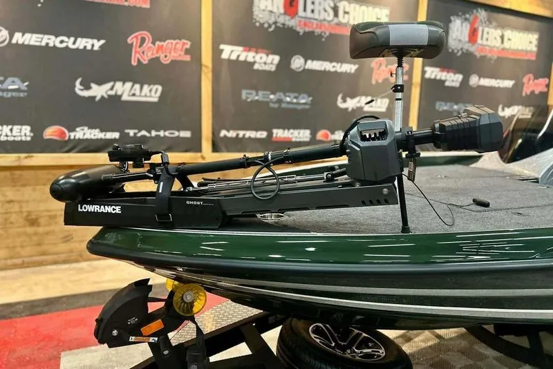 Slide: The Image of 2026 Triton 19 TrX boat with Lowrance Ghost trolling motor on display. - 8