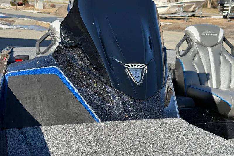 Slide: The Image of 2026 Skeeter ZXE21 boat with sleek design and sparkling finish. - 14