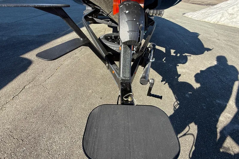 Slide: The Image of Close-up of 2026 Skeeter ZXE21 boat trailer hitch on asphalt. - 18