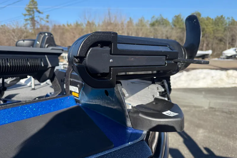 Slide: The Image of 2026 Skeeter ZXE21 boat detail with Minn Kota trolling motor, outdoors. - 20