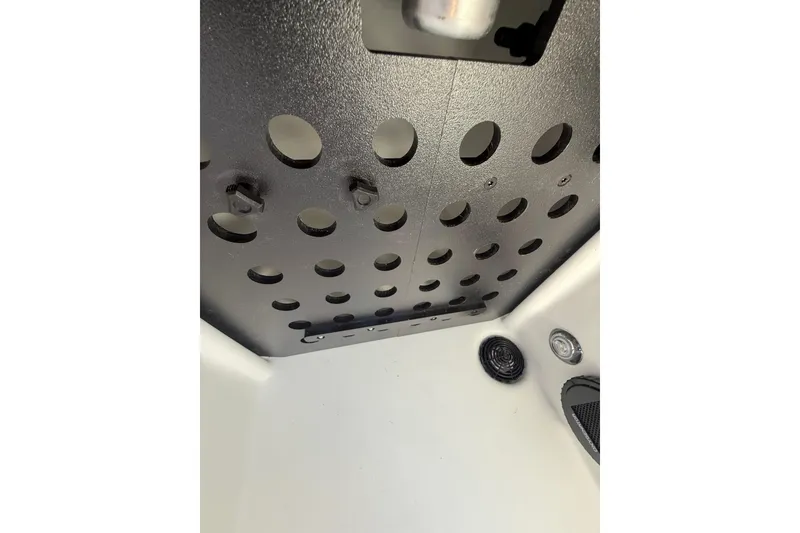 Slide: The Image of Interior view of 2026 Skeeter ZXE21 boat, featuring perforated panel and speaker. - 37