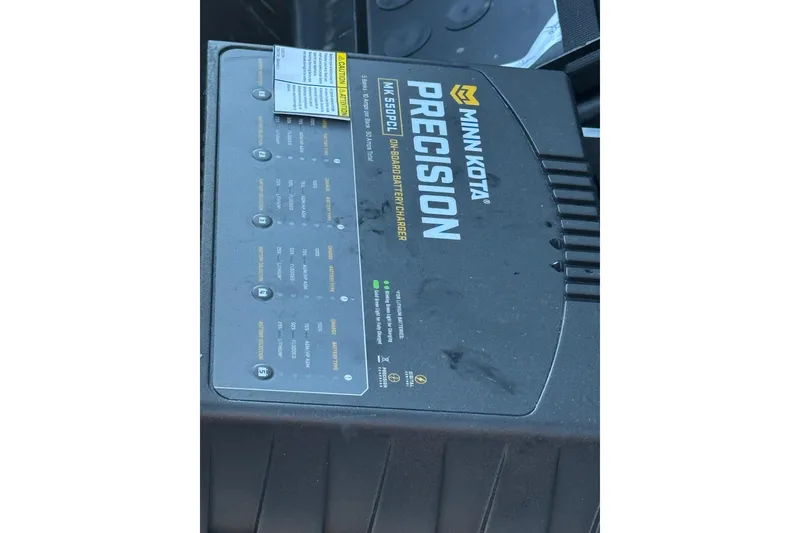 Slide: The Image of Minn Kota Precision onboard battery charger in a 2026 Skeeter ZXE21 boat. - 40