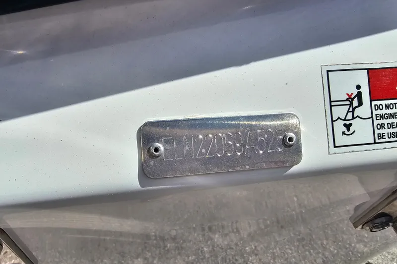 Slide: The Image of 2025 Savannah 220 IS boat identification plate with safety warning label. - 10