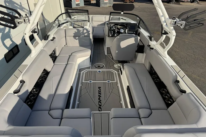 Slide: The Image of 2026 Moomba Tykon boat interior with sleek seating and modern dashboard design. - 9