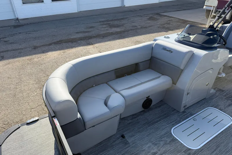 Slide: The Image of 2026 Bentley Pontoons Legacy 243 Navigator with luxurious seating and sleek design. - 12