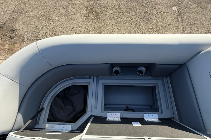 Slide: The Image of 2026 Bentley Pontoons Legacy 243 Navigator interior storage compartment detail. - 16