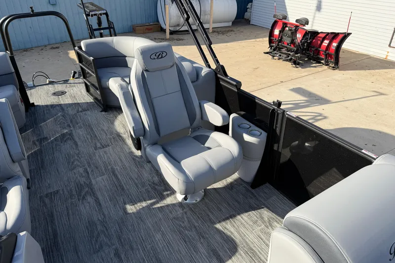 Slide: The Image of 2026 Bentley Pontoons Legacy 243 Navigator interior with luxurious seating and modern design. - 18