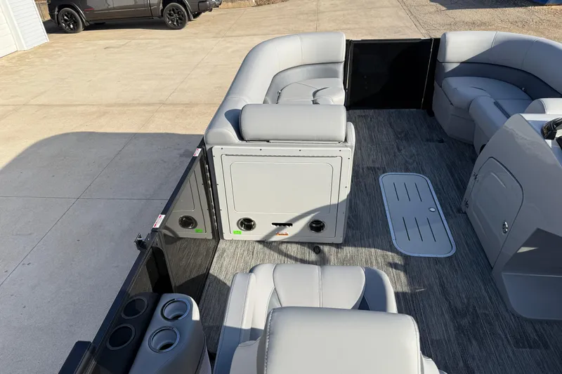 Slide: The Image of 2026 Bentley Pontoons Legacy 243 Navigator interior with gray seating and modern design. - 19