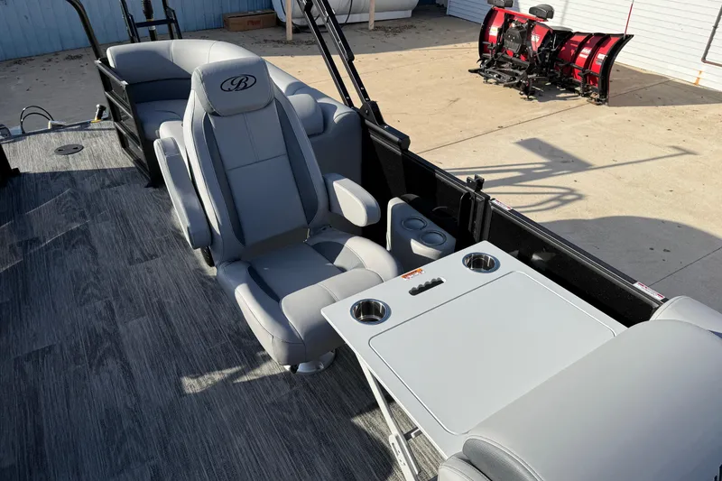 Slide: The Image of 2026 Bentley Pontoons Legacy 243 Navigator interior with gray seating and table. - 21