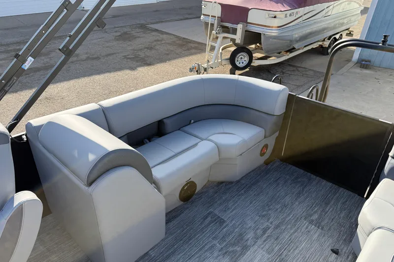 Slide: The Image of 2026 Bentley Pontoons Legacy 243 Navigator with luxurious seating and modern design. - 23