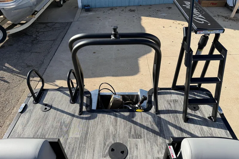 Slide: The Image of 2026 Bentley Pontoons Legacy 243 Navigator deck with ladder and railing details. - 26