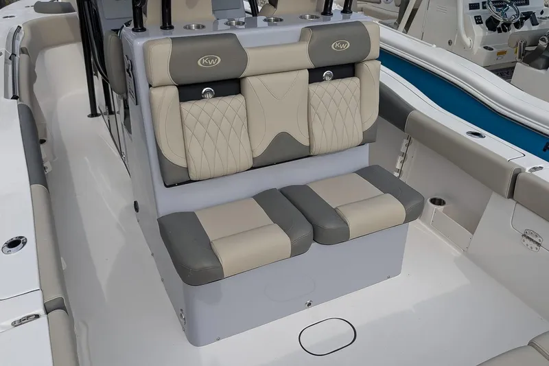 Slide: The Image of 2026 Key West 291 FS boat interior with cushioned seating and modern design. - 12