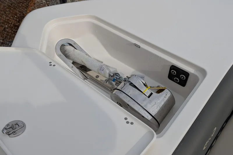 Slide: The Image of Anchor compartment of 2026 Key West 291 FS boat, featuring a secure anchor system. - 22