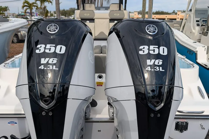 Slide: The Image of Twin Yamaha 350 V6 4.3L engines on a 2026 Key West 291 FS boat. - 4
