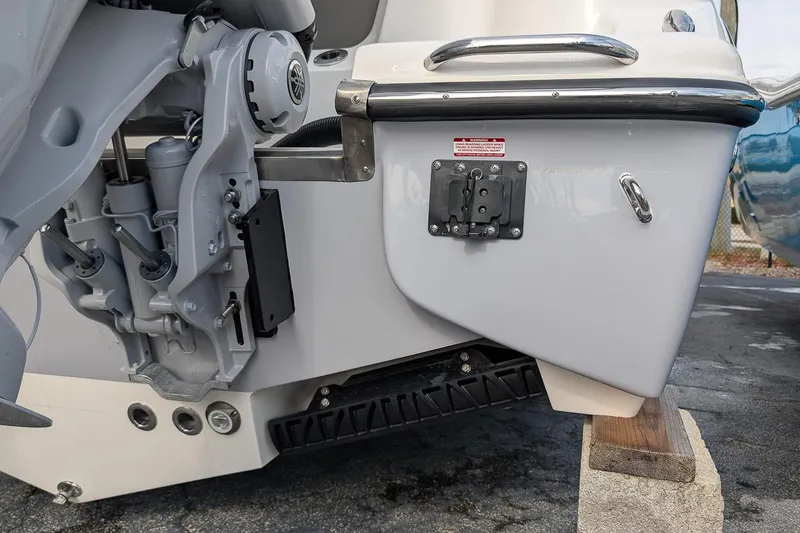 Slide: The Image of 2026 Key West 291 FS boat engine and transom detail. - 5