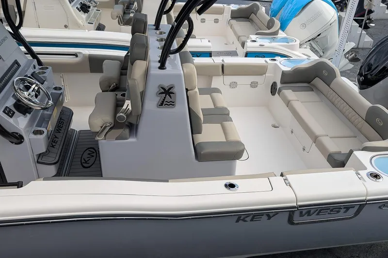Slide: The Image of 2026 Key West 291 FS boat interior with seating and steering console. - 8
