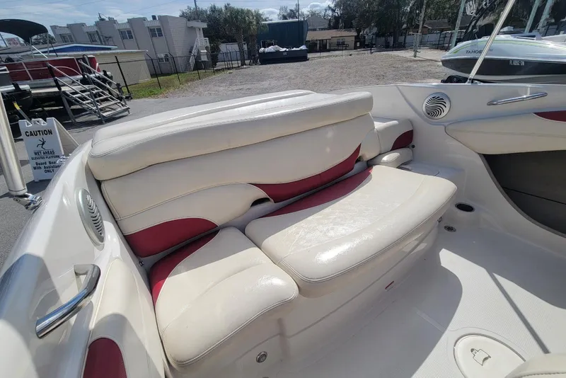 Slide: The Image of Interior of 2014 Tahoe Q7i boat with white and red seating. - 18
