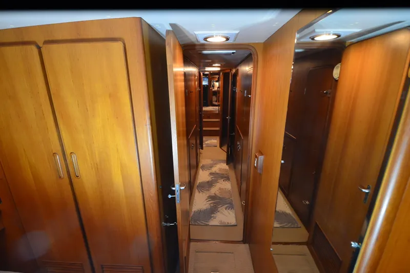 Slide: The Image of Interior hallway of 1990 Jefferson 52 Marquessa ED yacht with wooden paneling and carpet. - 32