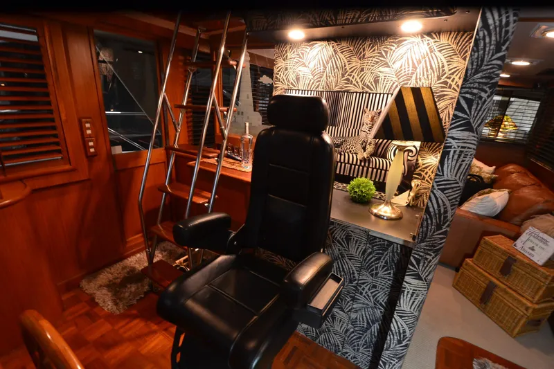 Slide: The Image of Luxurious interior of a 1990 Jefferson 52 Marquessa ED yacht with elegant decor and seating. - 41