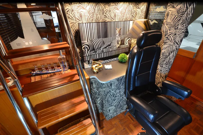 Slide: The Image of Luxurious interior of 1990 Jefferson 52 Marquessa ED yacht with elegant decor and seating. - 44