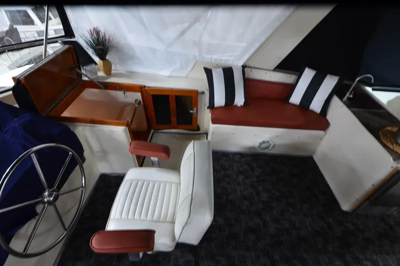 Slide: The Image of Interior of 1990 Jefferson 52 Marquessa ED yacht with helm, seating, and decor. - 46