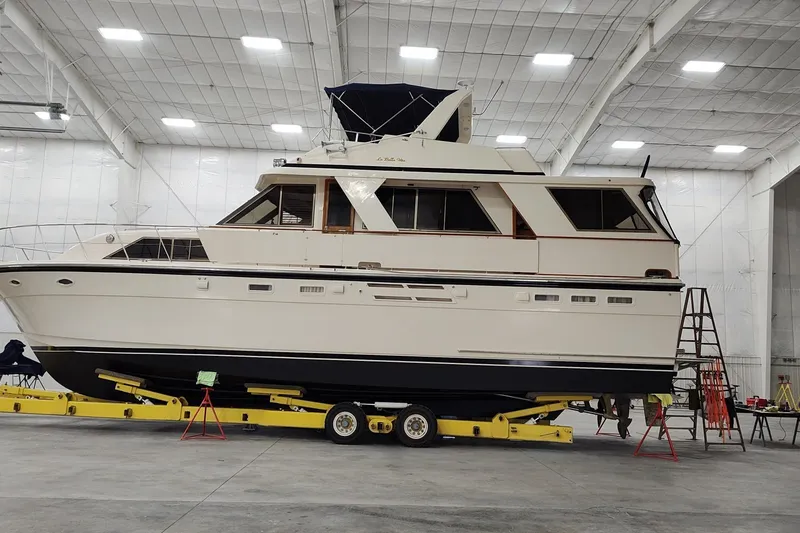 Slide: The Image of 1990 Jefferson 52 Marquessa ED yacht in indoor storage on trailer. - 5
