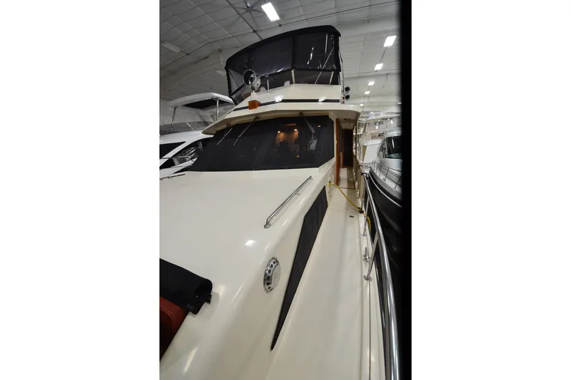 Slide: The Image of 1990 Jefferson 52 Marquessa ED yacht in indoor storage, side view. - 64
