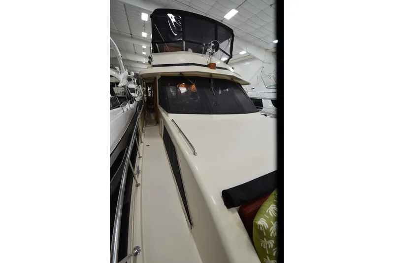 Slide: The Image of 1990 Jefferson 52 Marquessa ED yacht in indoor storage, side view. - 65