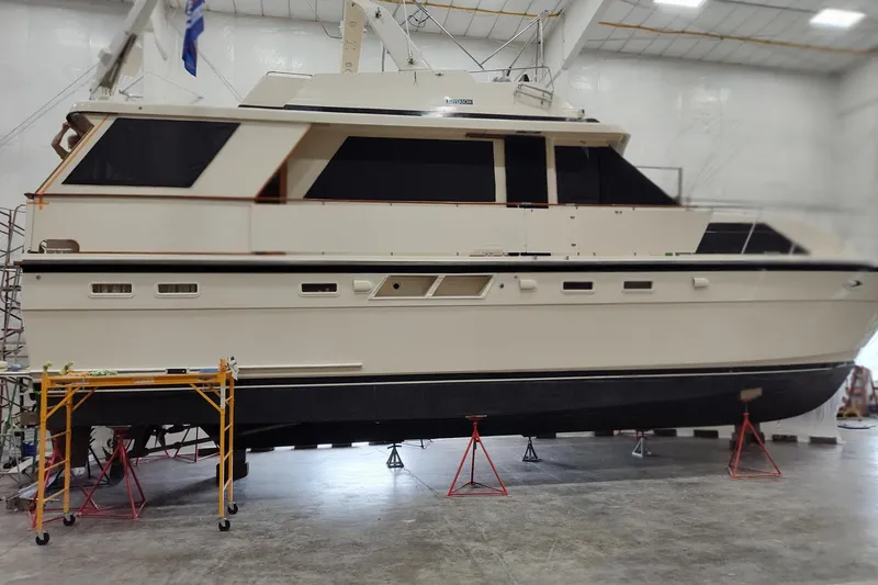 Slide: The Image of 1990 Jefferson 52 Marquessa ED yacht in a maintenance facility on stands. - 7