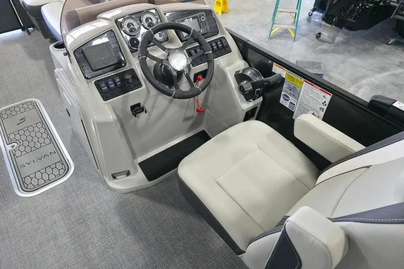 Slide: The Image of 2026 Sylvan Mirage X5 capacity label, 13 persons or 1835 lbs, 300 HP motor. - 10