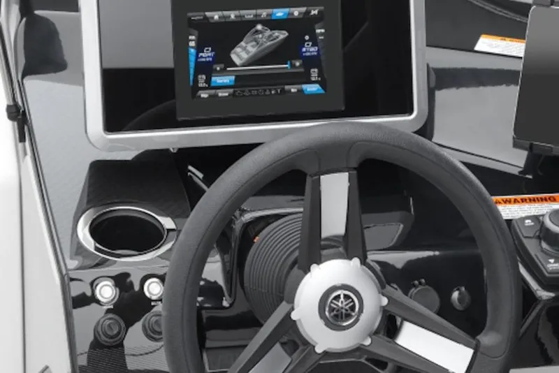 Slide: The Image of Steering wheel and dashboard of 2026 Yamaha Boats SX250 with touchscreen display. - 8