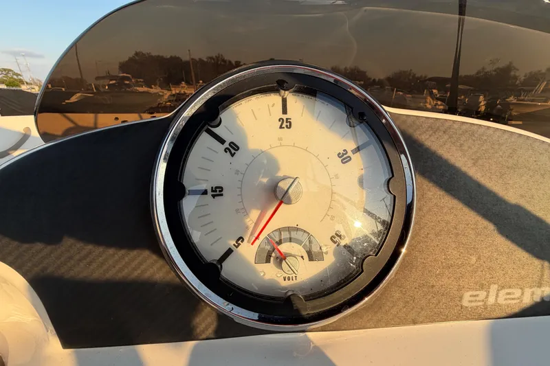 Slide: The Image of Close-up of 2019 Bayliner Element E16 speedometer and voltmeter on dashboard. - 21