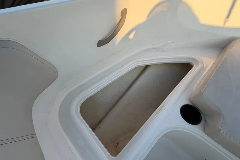 Slide: The Image of 2019 Bayliner Element E16 boat storage compartment, white interior detail. - 31